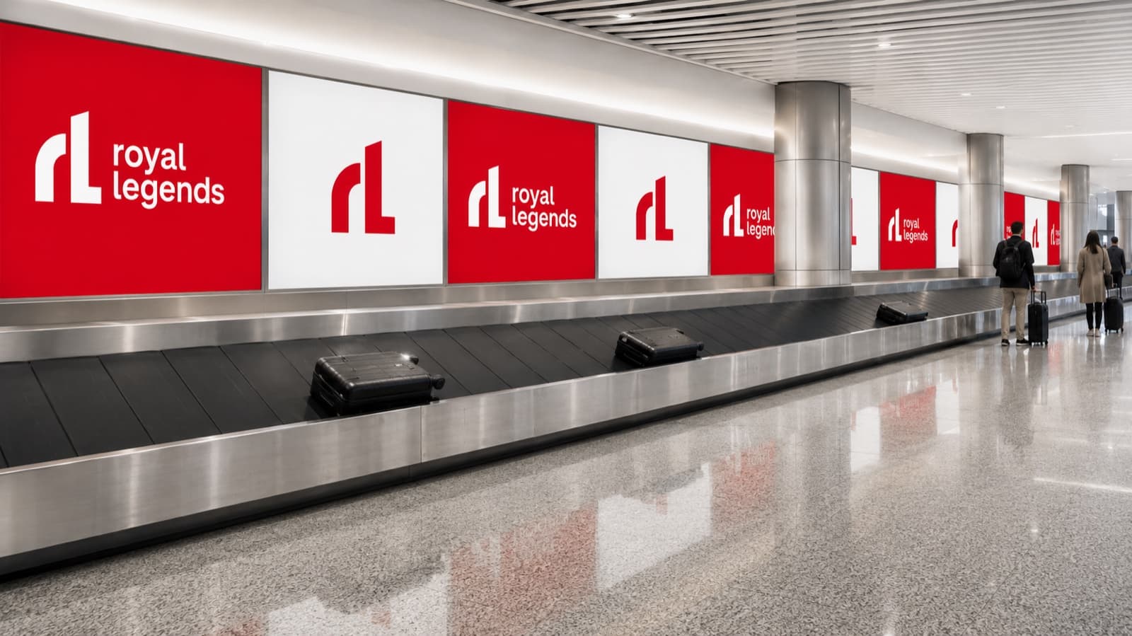 Red and white Royal Legends panels running the length of a baggage claim hall